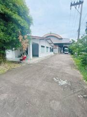 Exterior view of a commercial building with a driveway