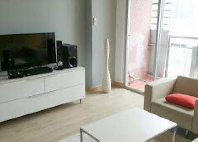 Modern living room with AC and balcony view