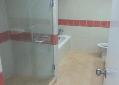 Bathroom with shower and bathtub