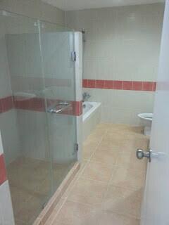 Bathroom with shower and bathtub