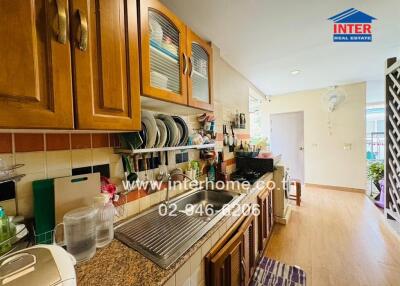 kitchen with wooden cabinets and modern appliances