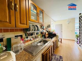 kitchen with wooden cabinets and modern appliances