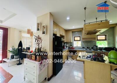 Spacious kitchen with modern appliances and adjacent dining area