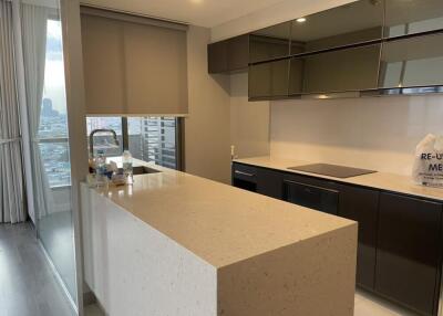 Modern kitchen with sleek cabinets and large island