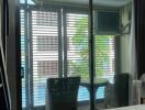 Bedroom with a view of the balcony through sliding glass doors