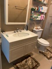 Bathroom with sink, toilet, and shower