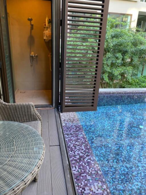 Poolside area with shower room