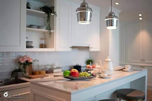 Modern kitchen with island and pendant lighting