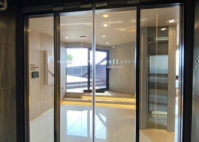 Main entrance with glass sliding doors