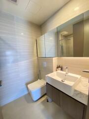 Modern bathroom with large mirror and sink