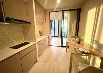 Modern kitchen with dining area and sliding glass door