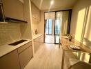 Modern kitchen with dining area and sliding glass door