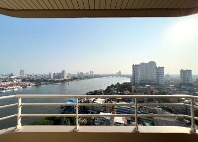 Balcony with river and city view