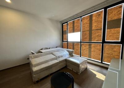 Modern living room with large windows and natural light