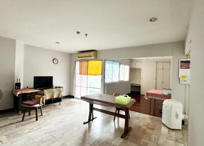 Spacious living and dining area with natural light