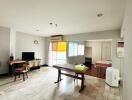 Spacious living and dining area with natural light