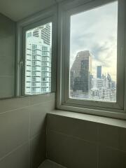 View of cityscape from interior window