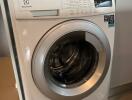 Washing machine in laundry area