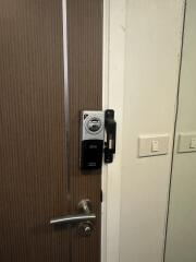 Door with electronic lock system and door handle