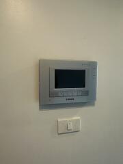 Wall-mounted control panel and light switch