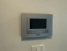 Wall-mounted control panel and light switch