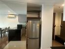 Modern kitchen with stainless steel refrigerator and washer