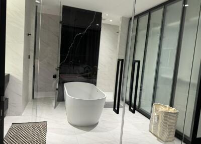 Modern bathroom with a freestanding bathtub