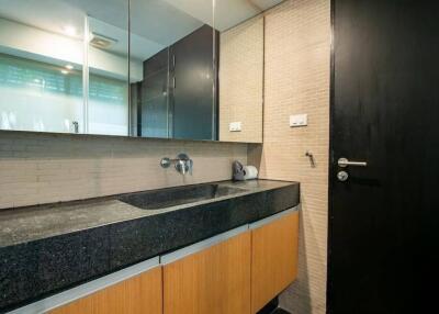 Modern bathroom with large mirror and sink