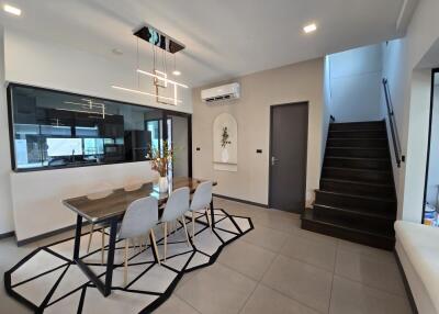 Modern dining area with contemporary furniture and decor