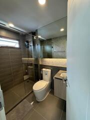 Modern bathroom with glass shower and sleek fixtures