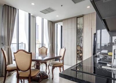 Modern kitchen and dining area with a view