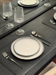 Elegant dining table set with glassware and plates