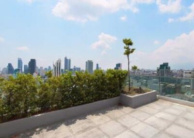 Rooftop terrace with city skyline view