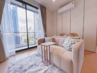 Modern living room with city view balcony