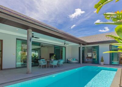 Spacious backyard with pool and patio seating