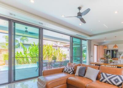 Modern living room with pool view