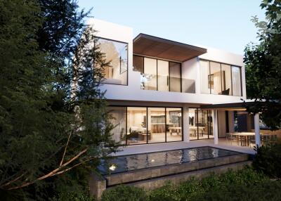 Modern house exterior with large windows and pool