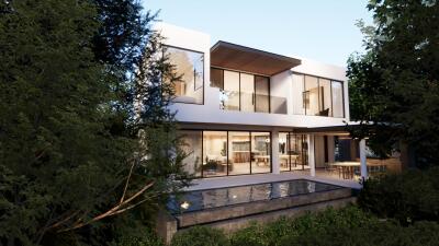 Modern house exterior with large windows and pool