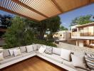 Outdoor living space with a comfortable L-shaped sofa and a pergola