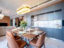 Modern kitchen and dining area with chandelier lighting