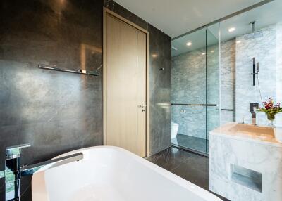 Modern bathroom with marble and glass features