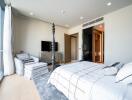 Modern bedroom with large windows and a four-poster bed