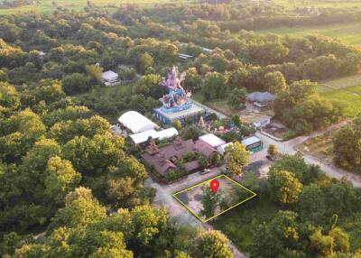 Aerial view of the surrounding area with a notable building