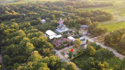 Aerial view of the surrounding area with a notable building