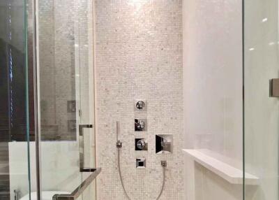 Modern bathroom with glass shower enclosure