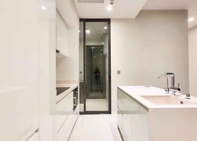 Modern kitchen with white cabinets and island