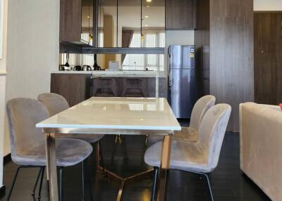 Modern kitchen and dining area with sleek furniture