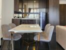 Modern kitchen and dining area with sleek furniture