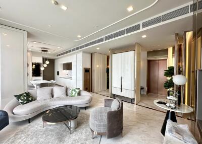 Modern living room with open kitchen and stylish décor