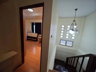 Staircase and entrance to room